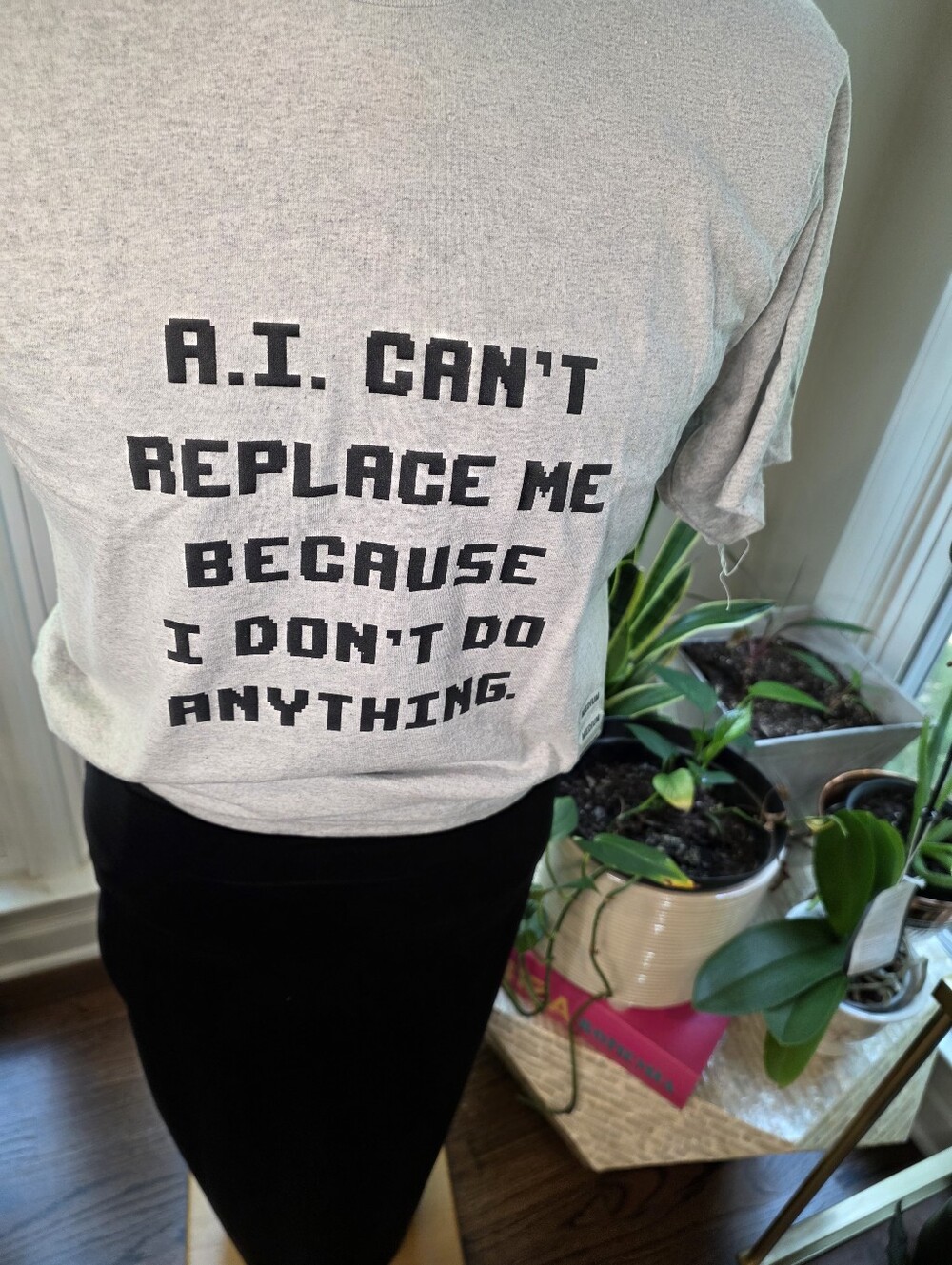 Unisex Graphic T Light Gray "A.I. Can't Replace Me Because I Don't Do Anything"